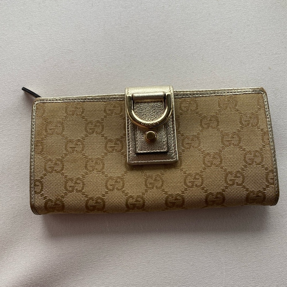 Authentic Gucci gold wallet